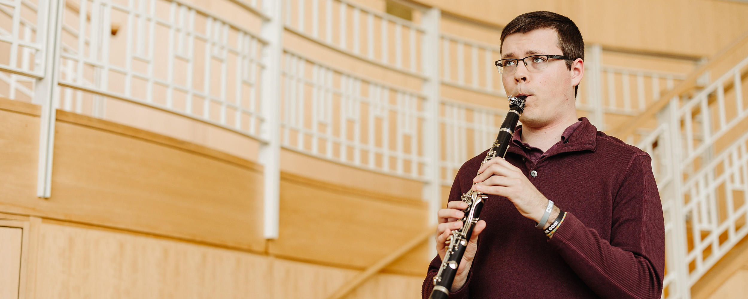A music performance student at Gordon College playing the clarinet.