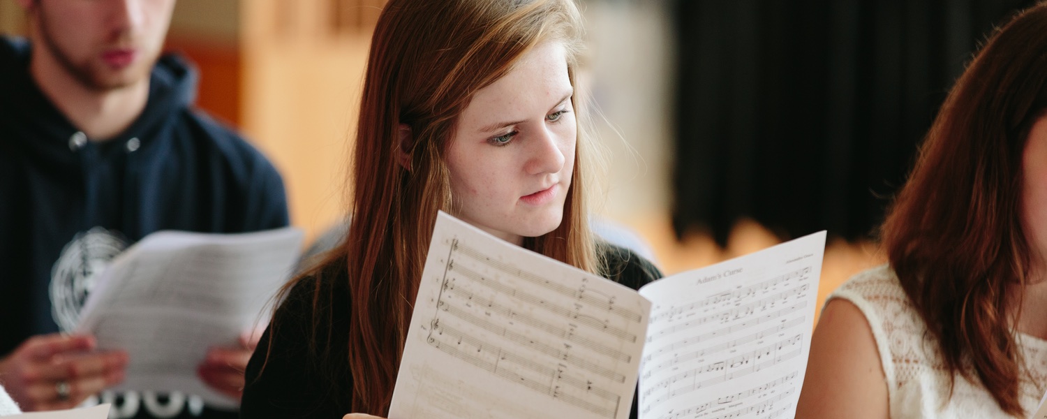 A music composition student learning during class at Gordon College.