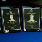 The honor plaques assembled on a table