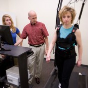 Dr. Peter Iltis (Kinesiology) working with a client on the Active Step treadmill