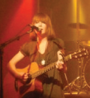 Meg Lynch performing onstage