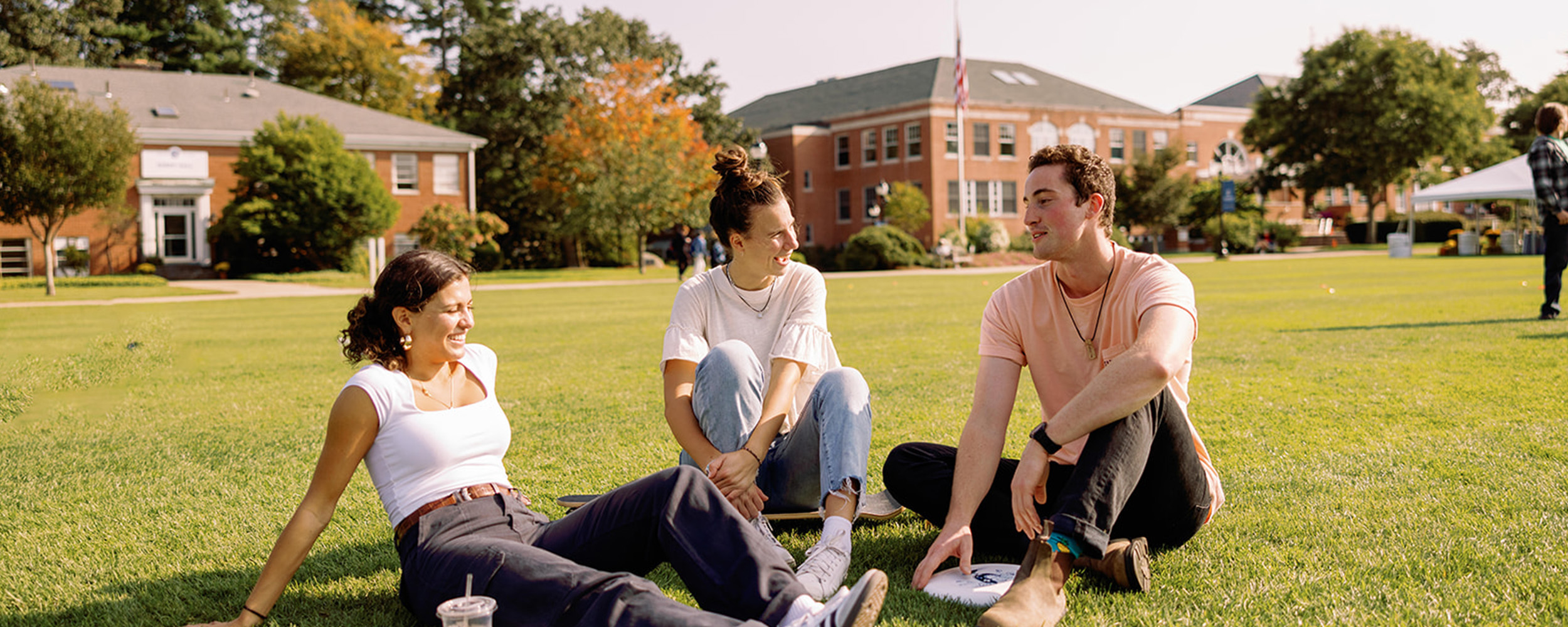 students hanging out on the quad