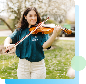 photo of student with her violin .