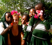 student with Ugandan kids